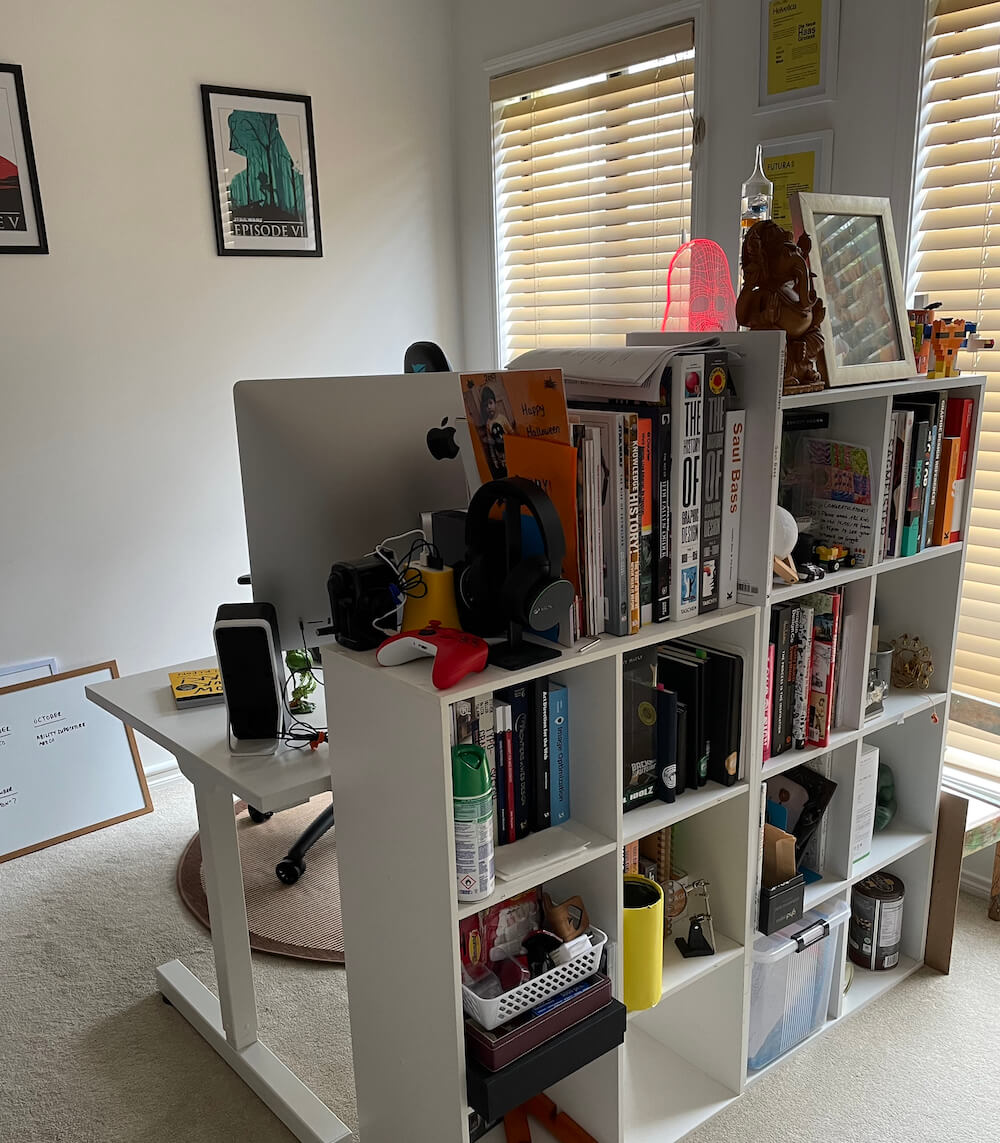 The back of my desk is covered by a couple of cube bookshelves.